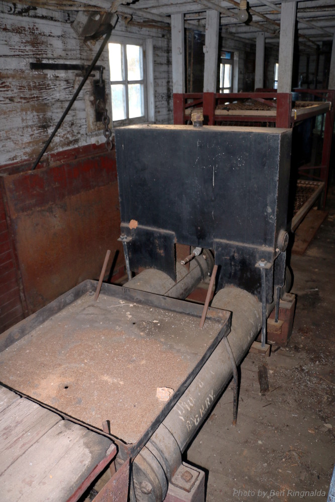 Front wing air cylinders with the oil tank and the pan of the missing stove above.