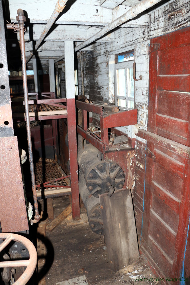 Tucked behind the bunk beds are the cylinders used to raise the left wing blade.